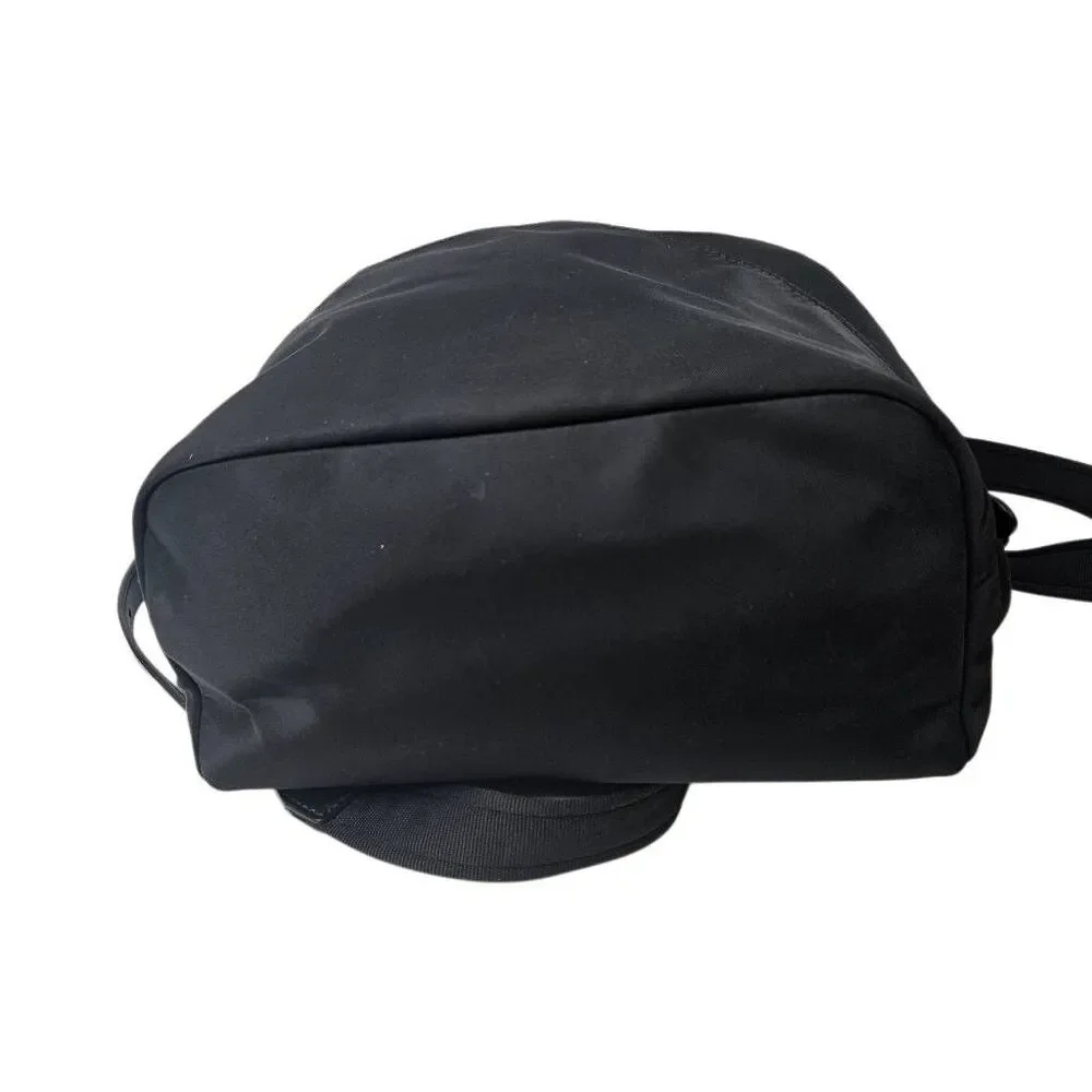 Kate Spade Karissa black nylon backpack, minimalist design.